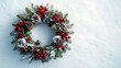© olga_demina - Christmas wreath with red berries and frosted pine cones against a snowy background. Festive decoration for winter holidays and Merry Christmas themes.