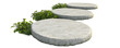 © EmPics - Three large round stepping stones in a neatly arranged garden path, bordered by green foliage, on a white background.