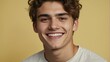 © Alteisen Riese - teenage american man on pastel yellow background model close-up smiling with beautiful teeth for ad concept space for text