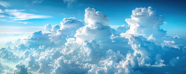 Wall Mural - A panoramic view of a blue sky with fluffy white clouds, creating a calming effect. Free copy space for text.