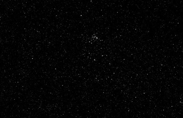 wide angle photograph of some of the stars (starfield) in the constellation serpens.