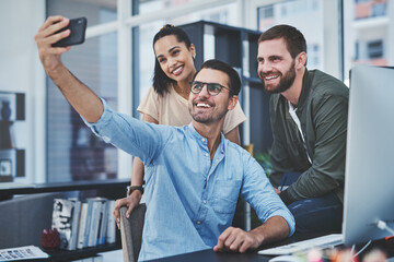 Poster - Happy, business people and selfie with picture at office desk for memory or photography together. Young, group or employees with smile or team in joy for moment, capture or social media at workplace