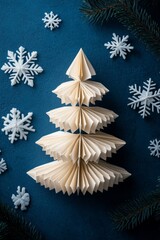 Wall Mural - paper christmas tree made from folded paper. this is an origami christmas tree.