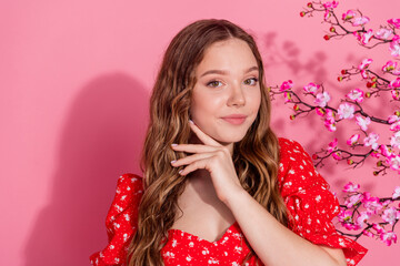 Canvas Print - Photo portrait of attractive teen woman touch face cherry blooming dressed stylish red clothes isolated on pink color background