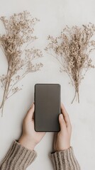 Canvas Print - A person holding a cell phone in their hands