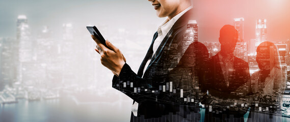 Wall Mural - Double Exposure Image of Business Communication Network Technology Concept - Business people using smartphone or mobile phone device on modern cityscape background. uds