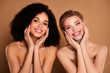 © Beauty Hero - Photo of pretty cute ladies dressed underwear top hands arms touching cheeks isolated beige color background