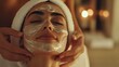 © BozStock - Closeup of woman receiving a facial treatment at a spa.