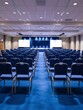 © you're doing great! - Empty conference hall with blue chairs Rear view (22)