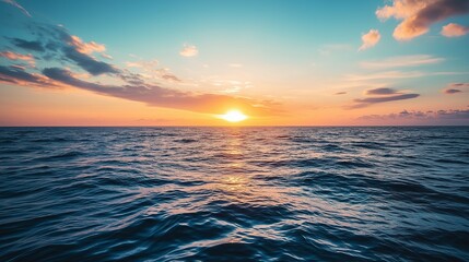 Poster - Stunning sunset over the calm ocean, showcasing warm colors and gentle waves just before twilight