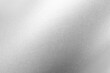 © New Africa - Shiny silver surface as background, closeup view