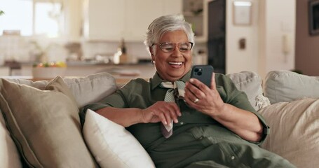 Poster - Senior woman, phone and happy on sofa, texting and reading with mobile app for contact in home. Person, smartphone and scroll with chat, notification and social network on lounge couch in retirement
