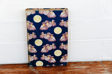 Vintage Book with Patterned Fabric Cover