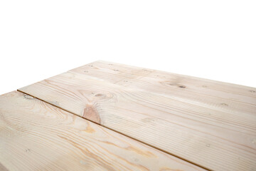 A wooden table is isolated over a white background. The table is empty and has a natural