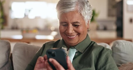 Poster - Senior woman, phone and smile on sofa, texting and reading with mobile app for contact in home. Person, smartphone and scroll with chat, notification and social network on lounge couch in retirement