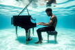 © Erik González - A man is playing the piano in the ocean