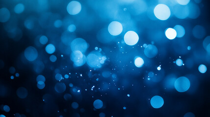 Canvas Print - Glowing blue bokeh lights create a dreamy atmosphere in a darkened setting