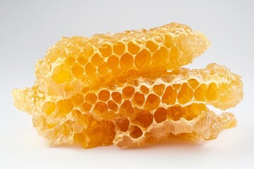 A close-up image of a piece of fresh German honeycomb, showcasing its natural, golden color and intricate hexagonal structure. This honeycomb represents the purity and quality of German honey, perfect