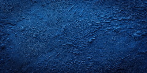 Navy blue textured surface with indigo color rough panoramic texture, a dark dramatic abstract background, navy blue, textured