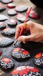 © dreamer82 - The artist creates his work on stone. Painted and hand-carved stone. Ai generative