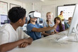 © ReeldealHD images - Girl pupil using a VR headset in computer science class