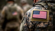 © HQAsset - Closeup of a Soldier's Camouflage Uniform with an American Flag Patch Displaying Patriotism and Military Service