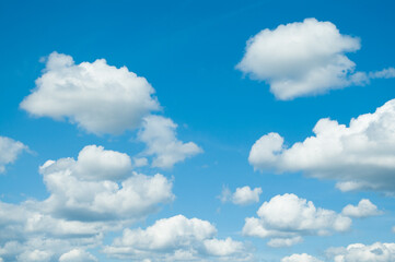 white clouds on blue sky close up