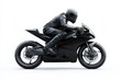 © khalid_spk - A motorcyclist riding a sleek, black motorcycle, dressed in full black gear and helmet