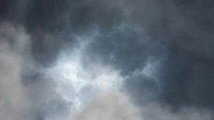 Wall Mural - Thunderstorm with lightning in dark clouds,ultra HD