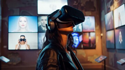 Poster - In a contemporary gallery, a woman engages with a virtual reality headset, surrounded by vibrant digital art displays on the walls, enhancing her immersive experience.