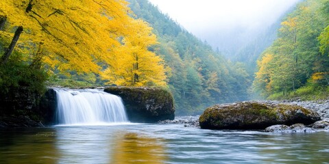 Beautiful autumn landscape with yellow trees and waterfall