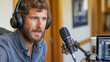 © EIKOZ - A clean and dynamic photograph capturing a young male podcaster recording an audio podcast in his modern home studio.