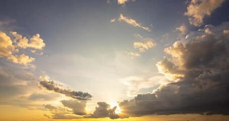 Wall Mural - Timelapse bottom view sunset in the clouds
