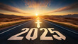 © Abdul - road with written 2025 and arrow pointing towards the horizon to represent the future and positivity and success of the new year