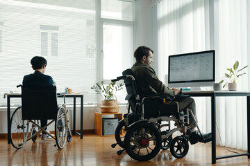 Business people with disability working in office at their workplaces