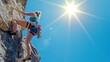 © Thanthara - Rock climbing. A woman climbs rocks in sunny weather.