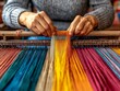 © Sasint - A skilled artisan weaving intricate patterns on a traditional loom, surrounded by colorful threads and fabrics, representing the art of handcrafts