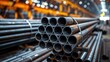 © Old Man Stocker - Piled Steel Pipes in Industrial Warehouse Setting