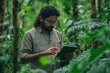 © ChaoticMind - An individual engaged with a tablet in a dense, lush green forest area, blending technology with nature, implying research, exploration, and connectivity with the environment.