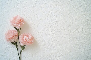 Wall Mural - A flat lay arrangement of pink flowers is displayed on a white background.