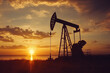 © Thierry Lombry - Pompe  à tête de cheval d'extraction de pétrole au coucher du soleil