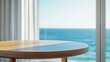 © Danielle - A modern round wooden table close-up in front of a bright window with light blue ocean view