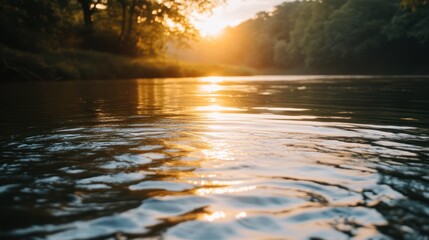 Wall Mural - A serene sunset reflecting on a calm river, surrounded by lush greenery.