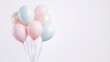 © Dreamer Castle - A cluster of pastel-colored balloons, hovering against a white backdrop, evoking a sense of lightness and joy