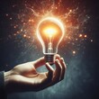 © Anastasiia - A hand holding a glowing light bulb, surrounded by a network of abstract energy lines. The image represents the flow of ideas, innovation, and technology in a dynamic and futuristic style.. AI