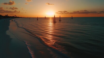 Stunning sunset view with a sailing boat near the sandy shore of a tranquil beach at dusk