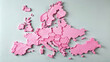© PuriStudio - A pink map of Europe is displayed against light gray background, showcasing distinct shapes of various countries. This artistic representation highlights continents geography in unique and vibrant way