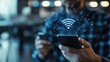 © Johannes - Wifi internet access concept. man using smartphone connect communication, social network, business contact, online shopping via internet wifi hotspot high speed. Fast internet wifi hotspot sharing.