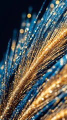 Wall Mural - A vivid close-up reveals golden and blue fibers radiating light, creating a mesmerizing display of textures and colors against darkness