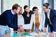 © peopleimages.com - Collaboration, explaining and women with paperwork, office and people in meeting, lobbyist and professional. Business, talking and employees with documents, planning and communication in boardroom